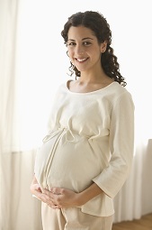 Pregnant woman smiling