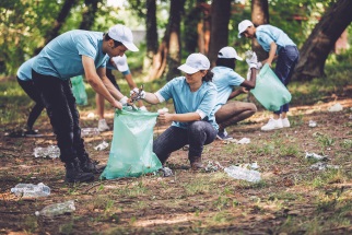 Volunteer crew outdoors, picking up trash