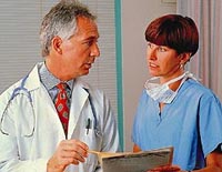 Picture of a doctor and nurse reviewing a patient