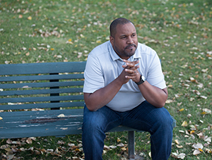 Men sitting on a park bench